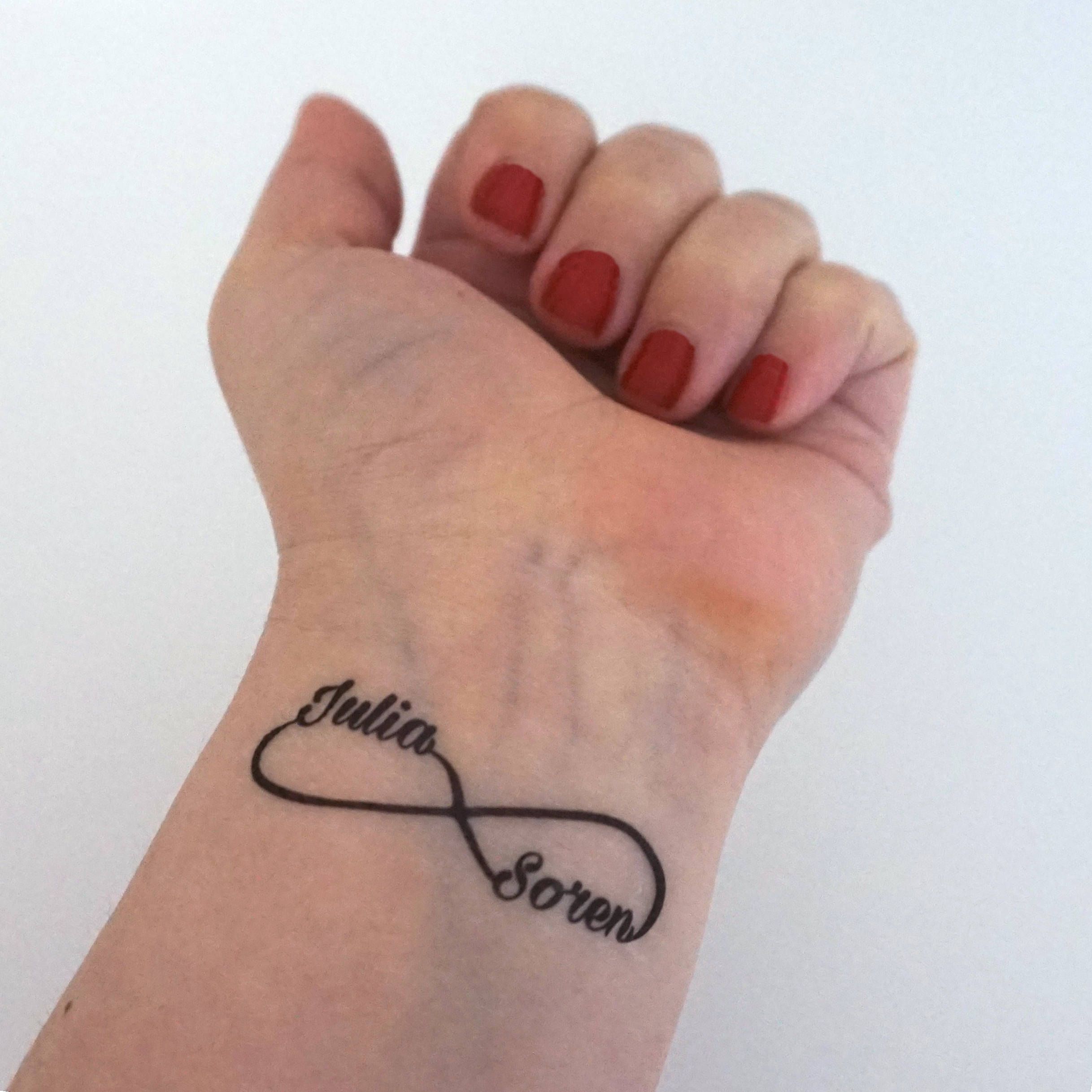 Tattoos von flechas con nombre 17
