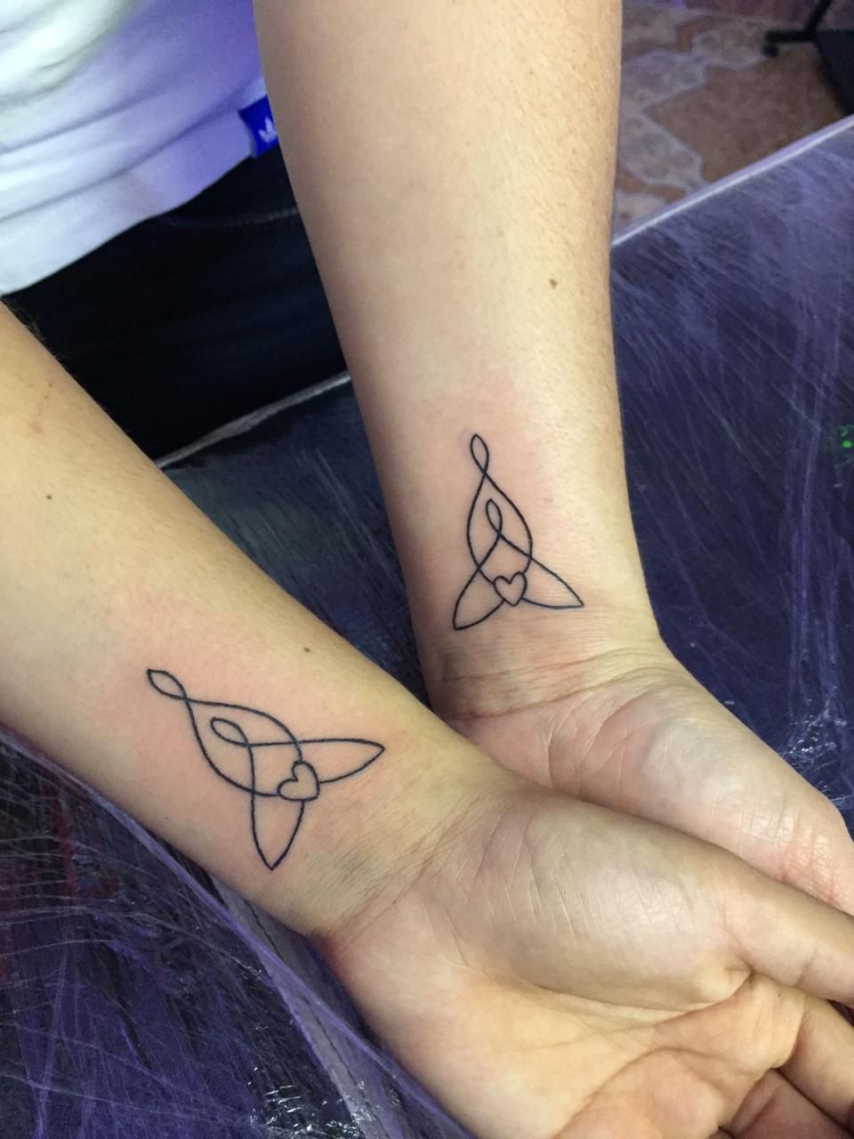 Tattoos of madre e hija 15