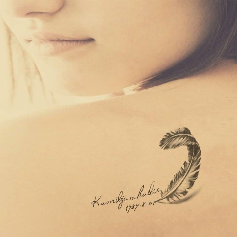 Tatuajes de nombres atras del brazo 7