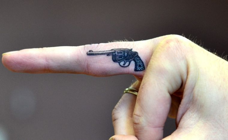 Tattoos of pistolas 12