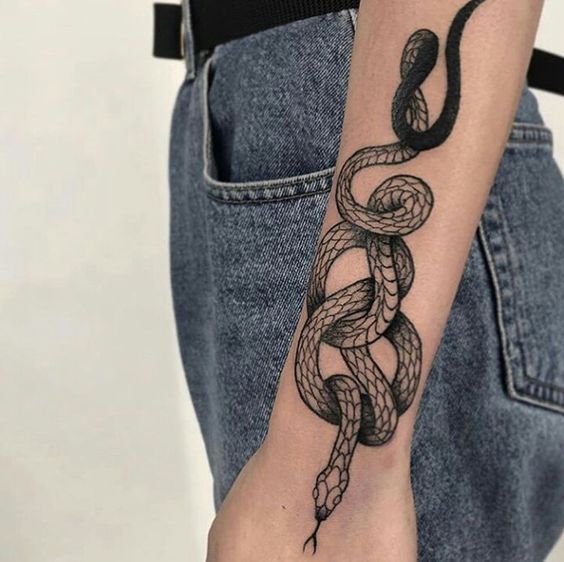 Tatuaggi di serpiente en el brazo 8