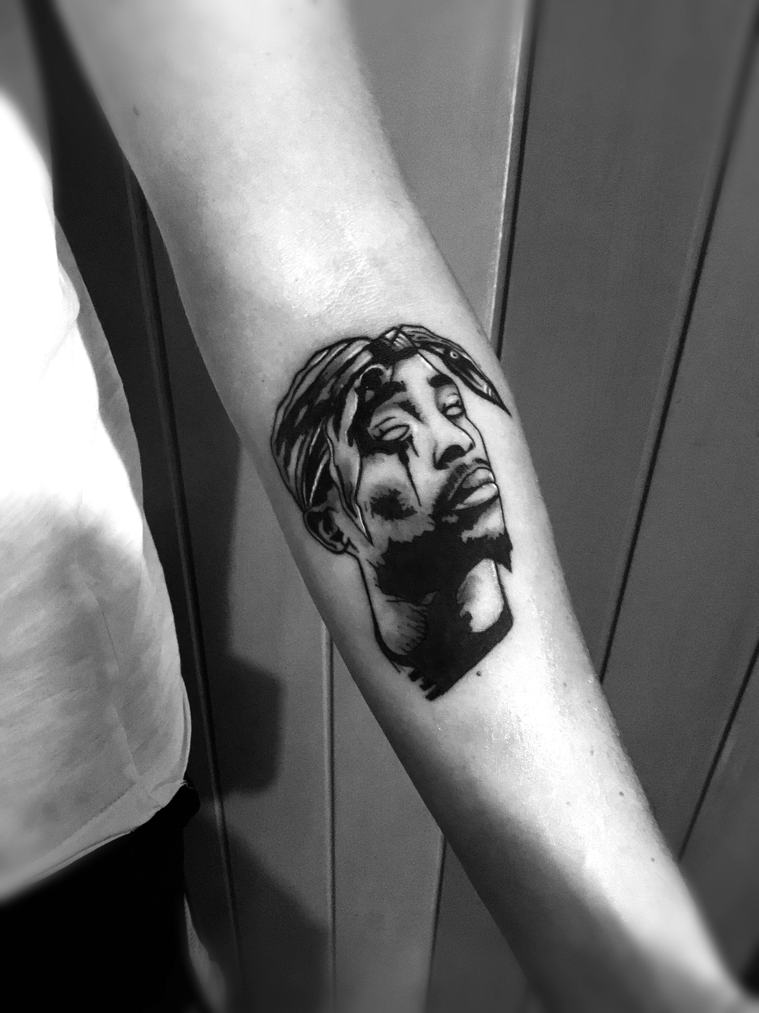 Tattoos of tupac 52