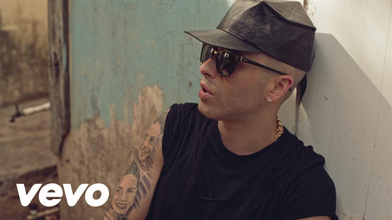 Tattoos of wisin 34
