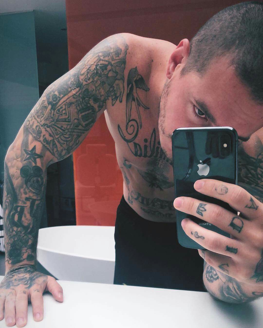 Tattoos of wisin 23