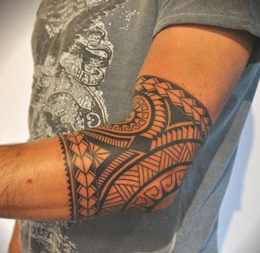 Tatuajes en Codo para Hombre 22