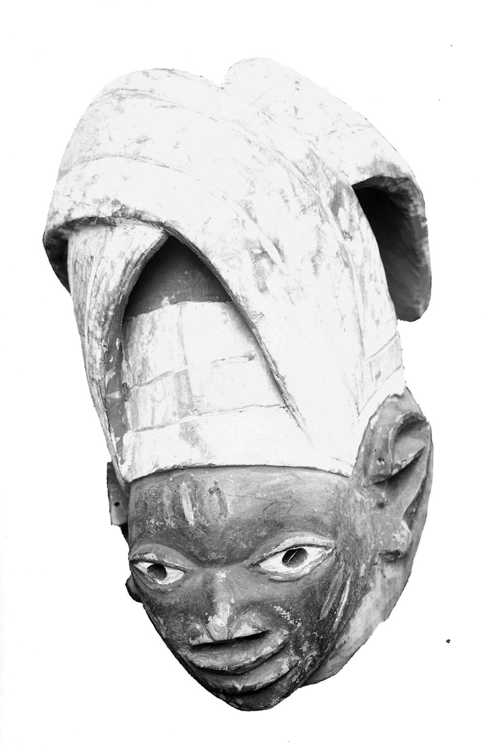Polychrome wood male mask with special head tie for Gelede Society dances. Scarification patterns on cheeks and forehead. Condition good. Surface abrasions on face and neck; edges slightly chippe