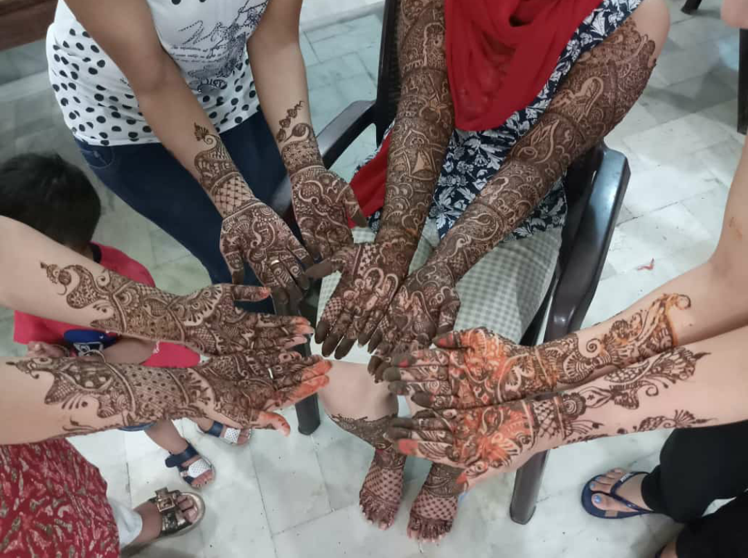 Henna symbolises purity , newness and optimism in traditional hindu culture in India.Different designs are made on hands with henna. Brides and bride mates apply henna on hands , the day before the we