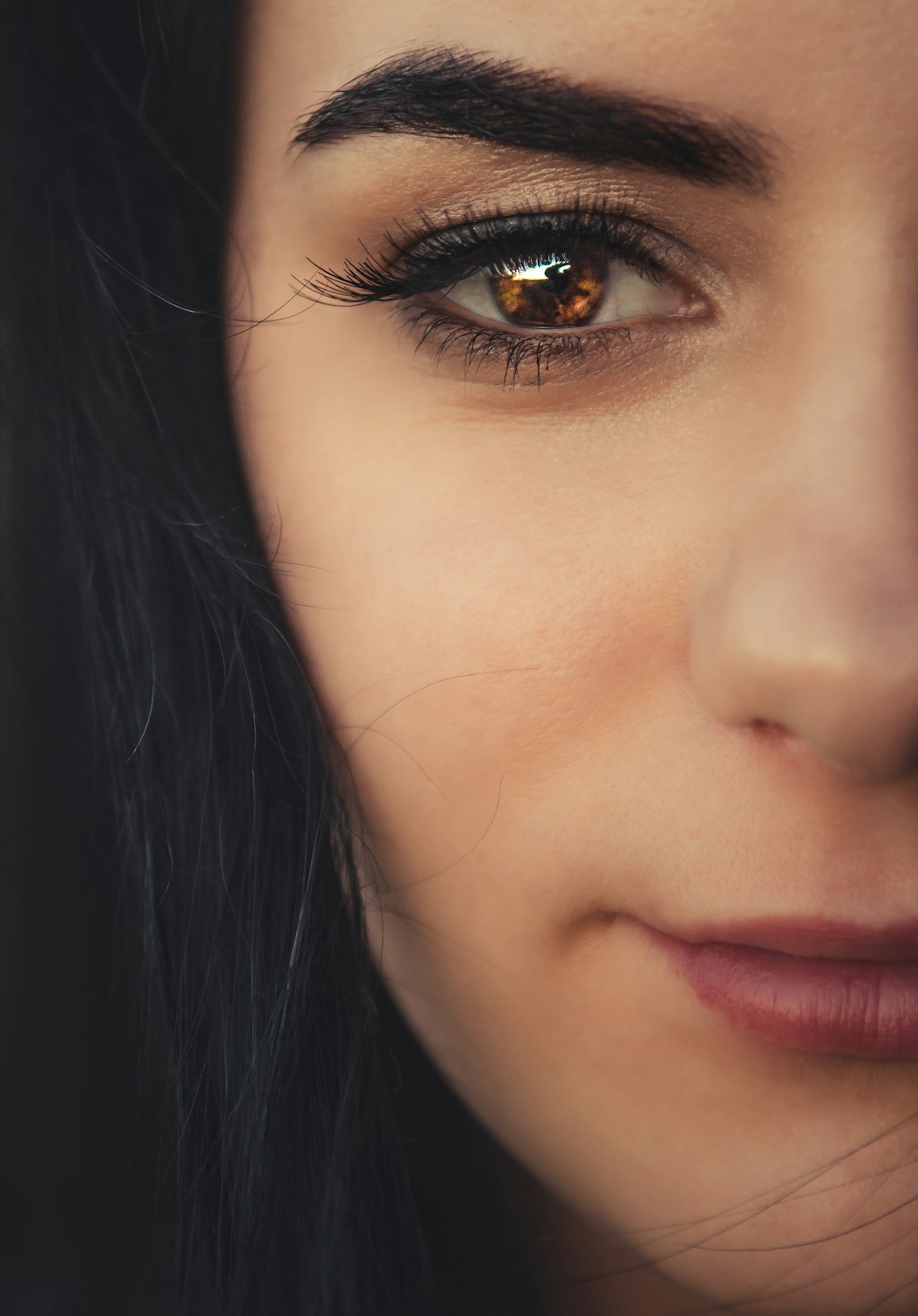 woman with right brown eye