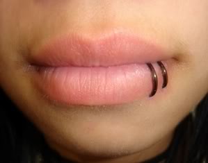 Double lip piercing (spider bites)
