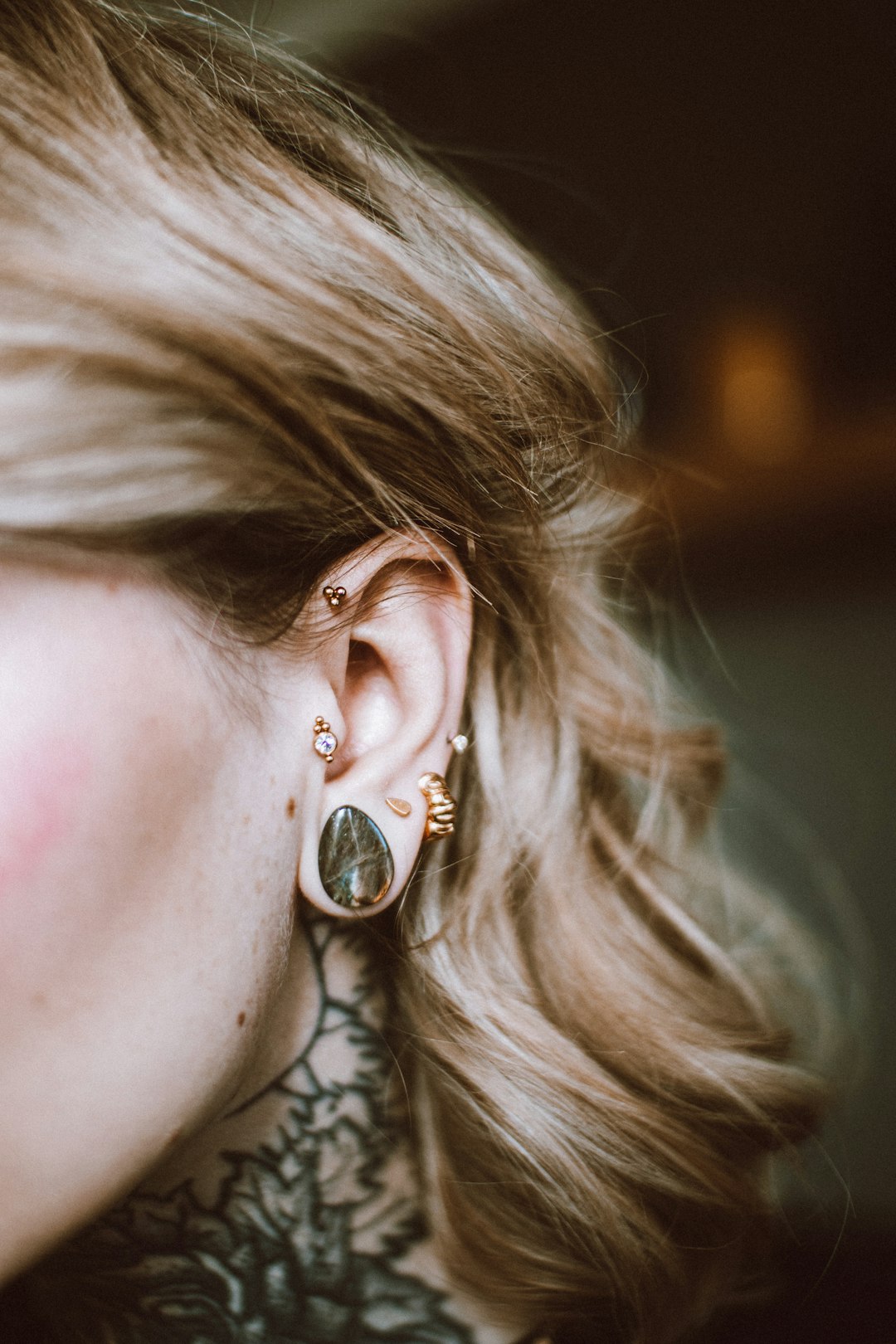 a person with a piercing