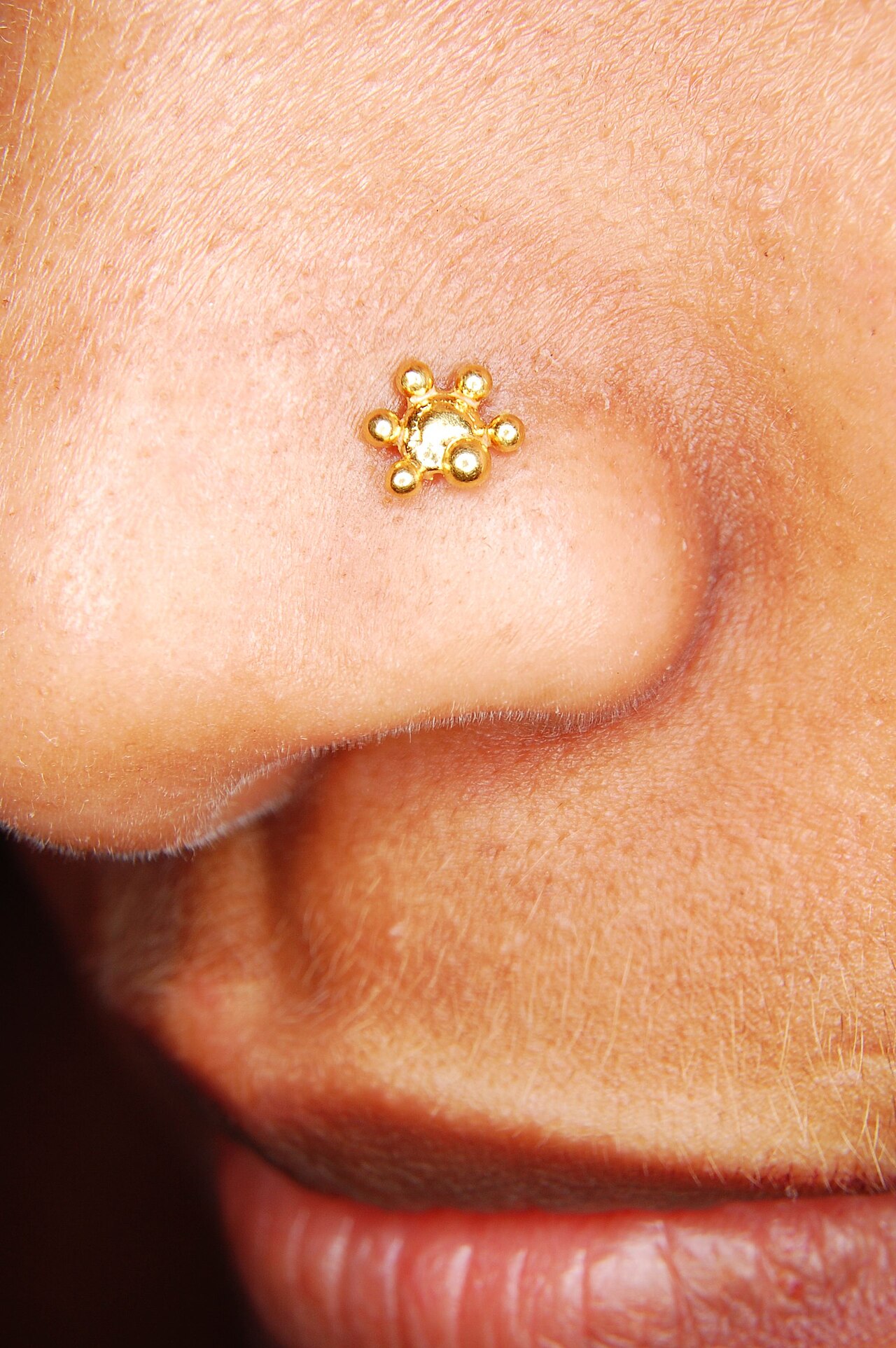 Nose piercing.