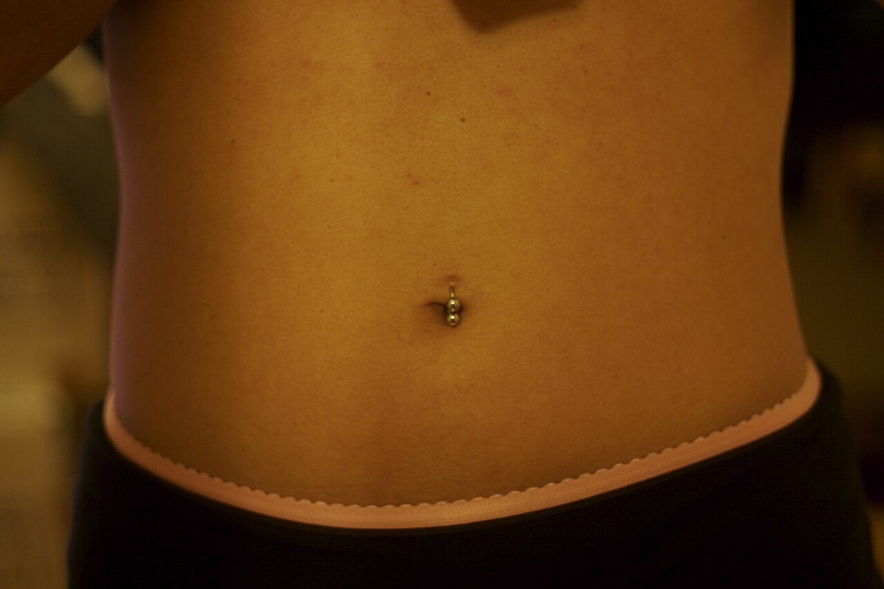 Women with navel piercing.