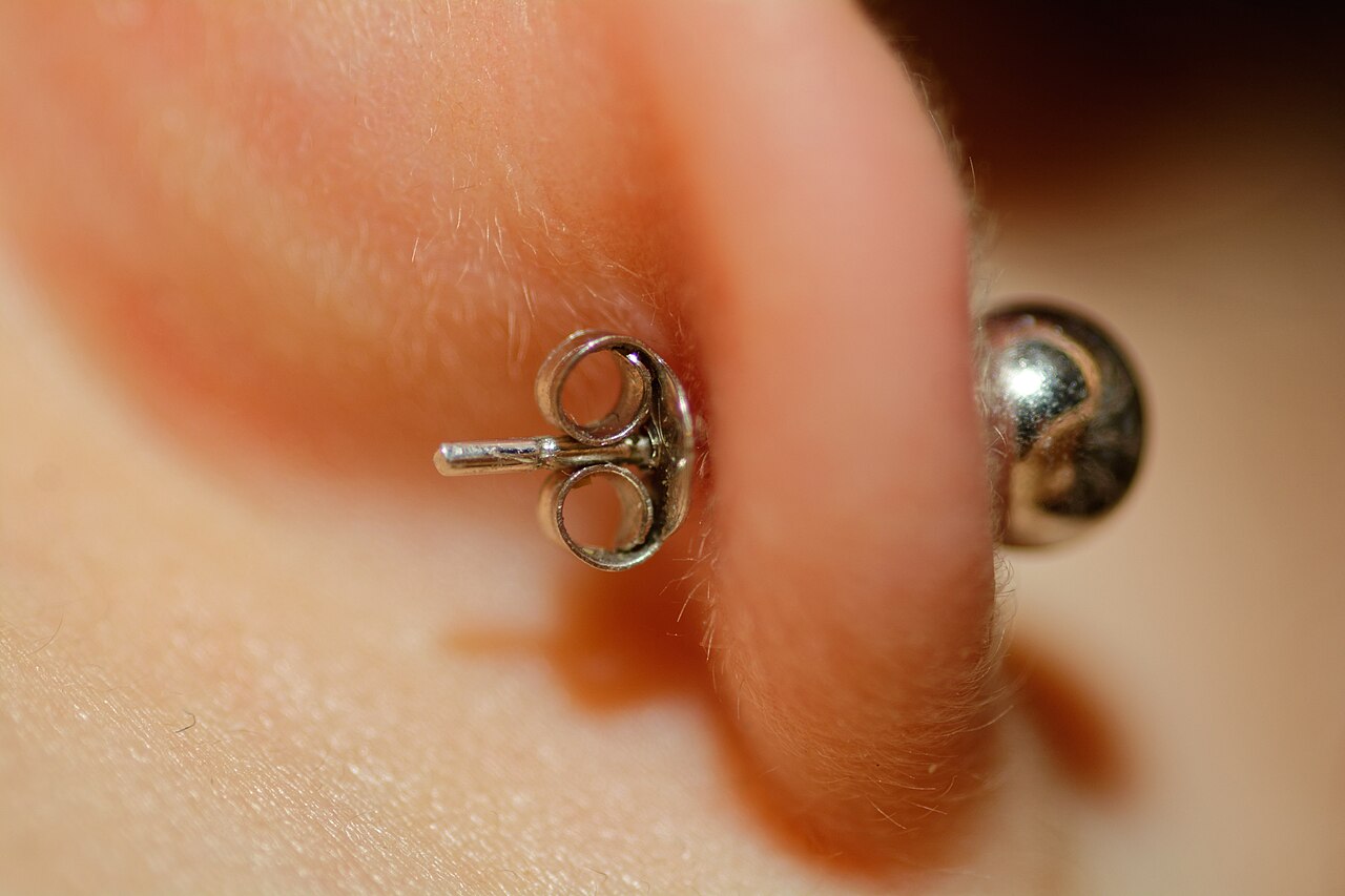 Close-up of the back of a stud earring.