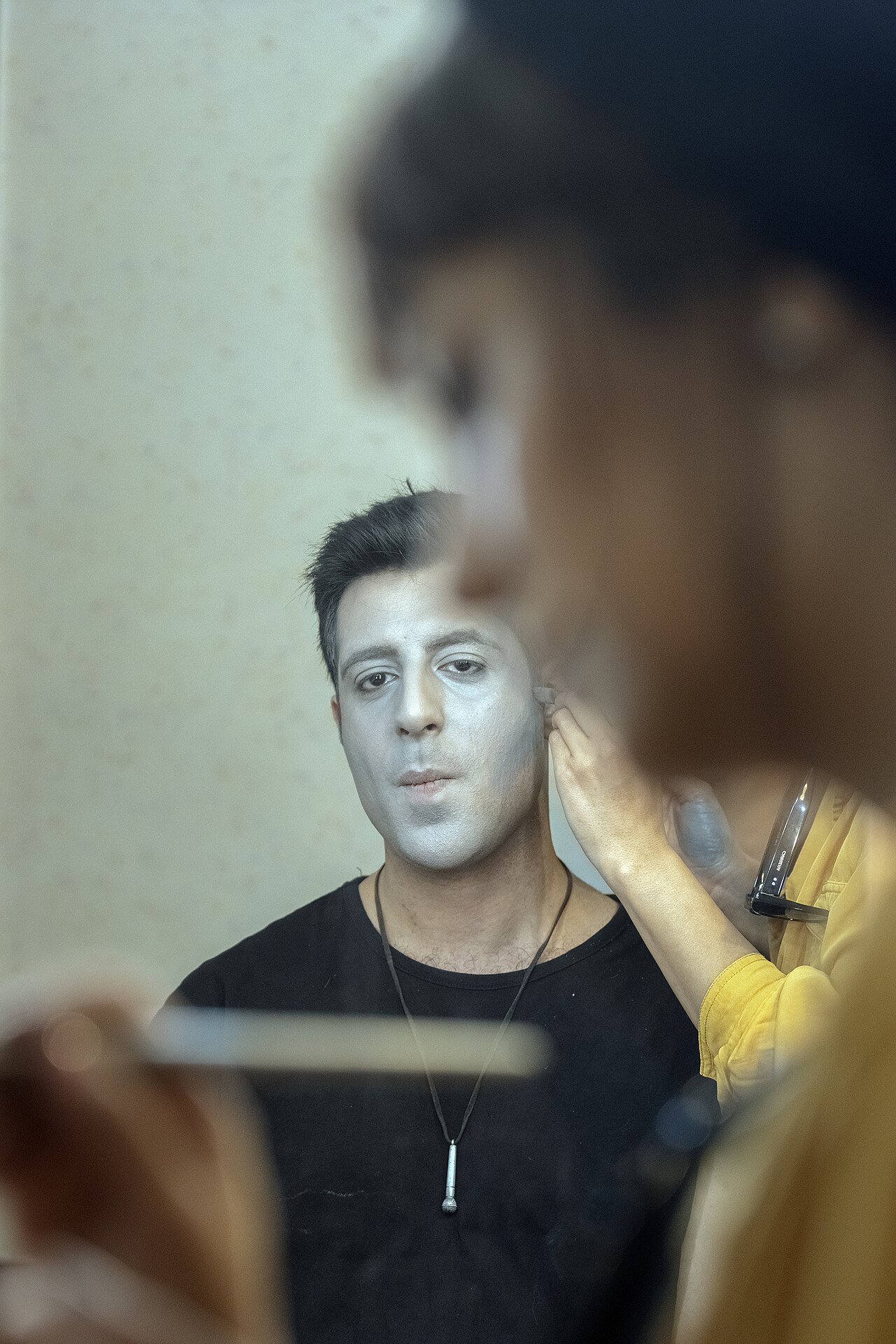 A make-up artist, also called a makeup artist, and often shortened to MUA, is an artist whose medium is the human body, applying makeup and prosthetics on others for theatre, television, film, fashion