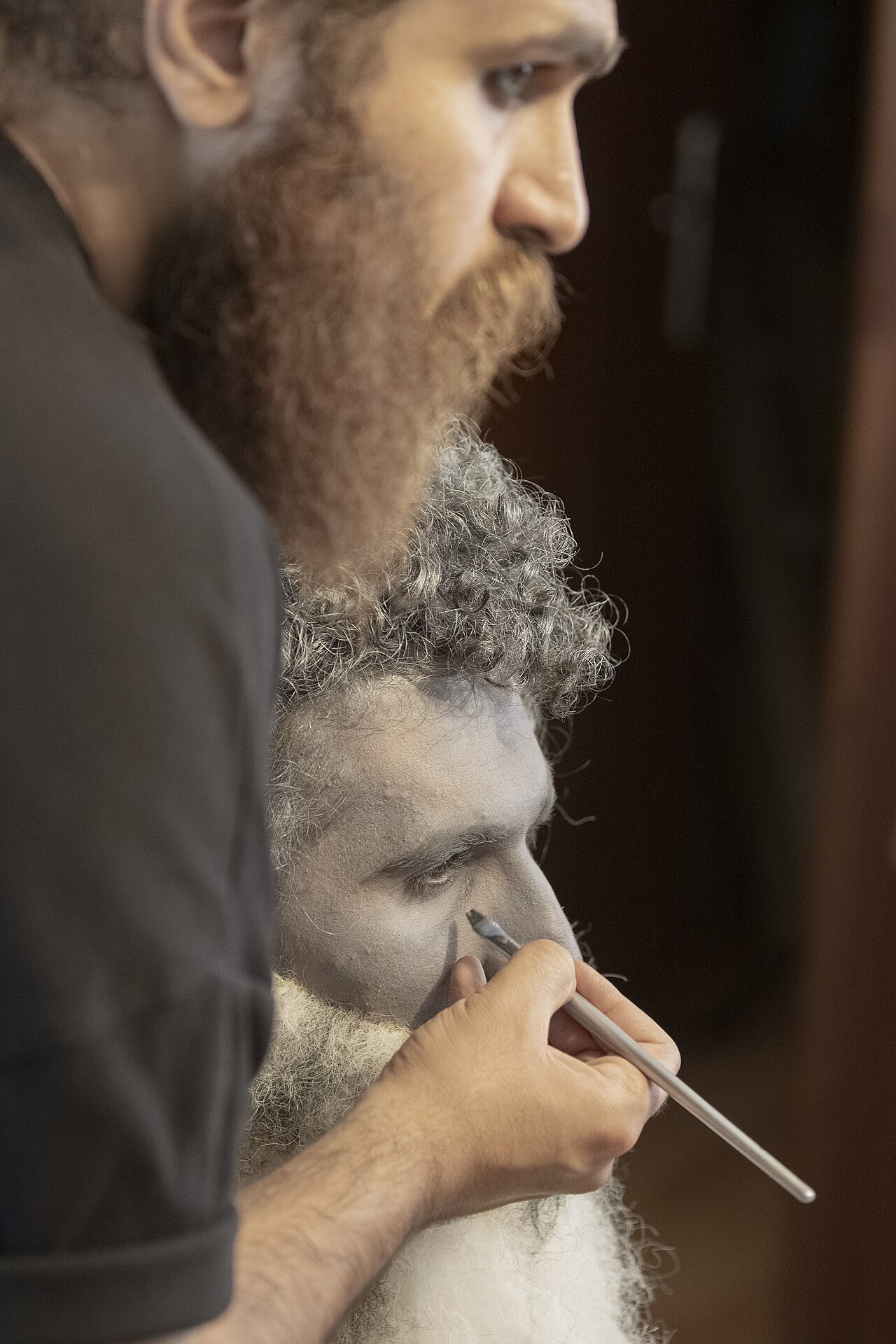 A make-up artist, also called a makeup artist, and often shortened to MUA, is an artist whose medium is the human body, applying makeup and prosthetics on others for theatre, television, film, fashion