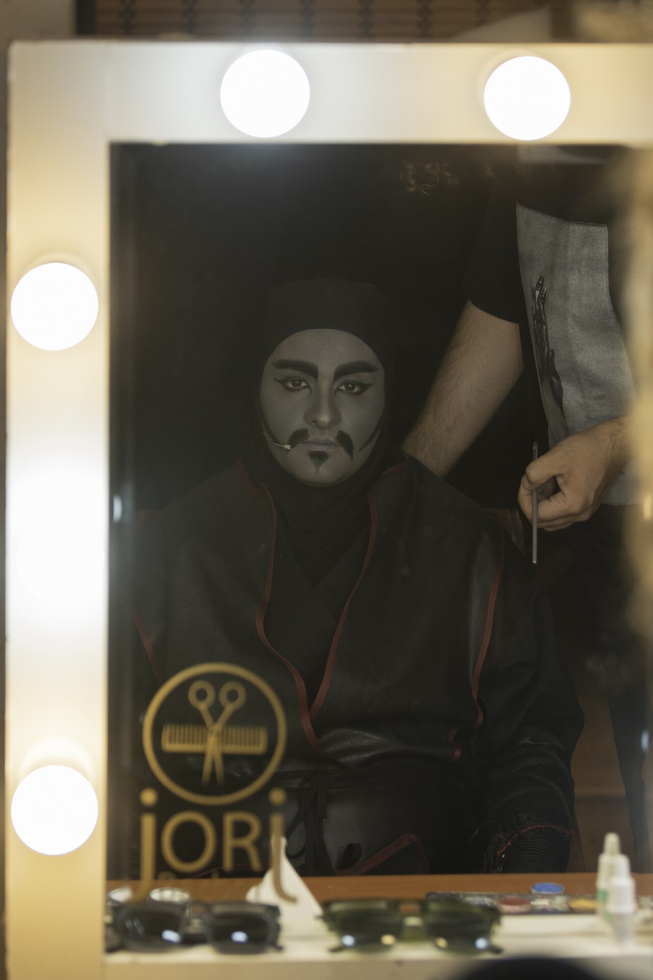 A make-up artist, also called a makeup artist, and often shortened to MUA, is an artist whose medium is the human body, applying makeup and prosthetics on others for theatre, television, film, fashion