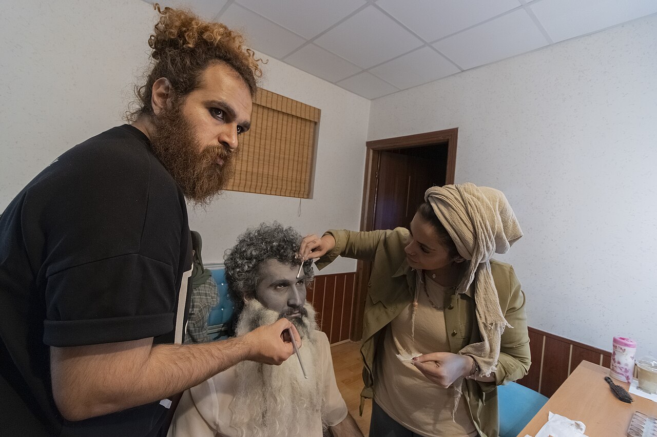 A make-up artist, also called a makeup artist, and often shortened to MUA, is an artist whose medium is the human body, applying makeup and prosthetics on others for theatre, television, film, fashion