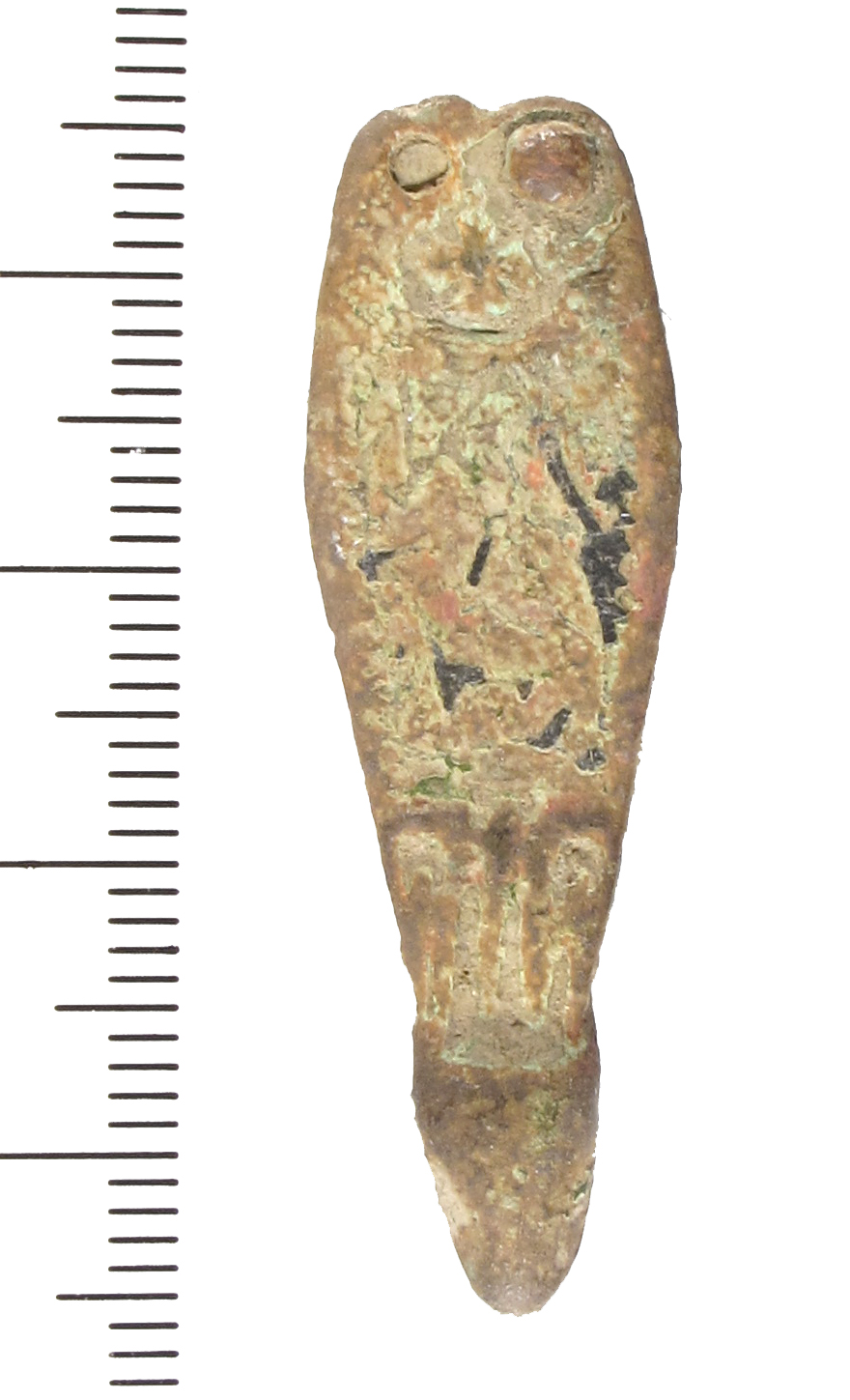 A late Saxon copper alloy strap end, Thomas type A. The strap-end is tongue-shaped and has two rivet holes at the bifurcated attachment-end. The terminal is in the form of an animal head; it is much w